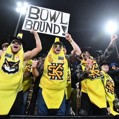 Kennesaw State fans celebrate after Kennesaw State beat UTEP during an NCAA college football game at Fifth Third Stadium, Tuesday, Oct. 28, 2025, in Kennesaw. Kennesaw State won 33-20 over the University of Texas at El Paso. (Hyosub Shin/AJC)