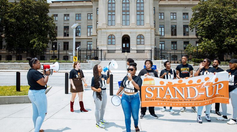 Abortion rights activists protest outside the Georgia State Capitol in Atlanta on Friday, June 24, 2022. The Supreme Court’s decision to overturn Roe v. Wade shifted the abortion fight to state legislatures, where gerrymandering has given Republicans an advantage. (Kendrick Brinson/The New York Times)