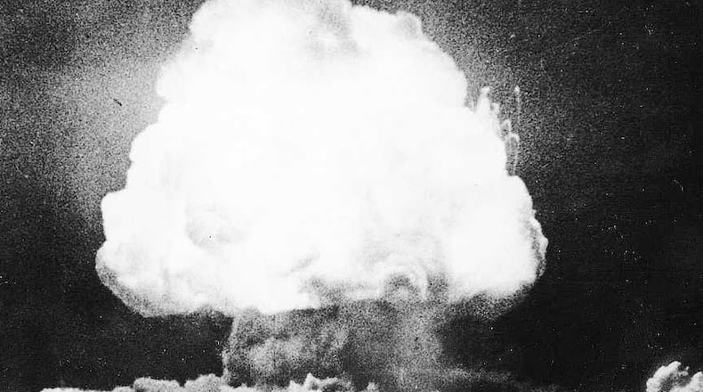 Ten seconds after detonation a mushroom cloud rises as the world s first atomic device explodes at Trinity Site, New Mexico, on July 16, 1945.