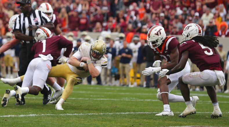 Georgia Tech quarterback Zach Pyron scores a touchdown in the second half Saturday against Virginia Tech in Blacksburg, Va. (Matt Gentry/The Roanoke Times via AP)