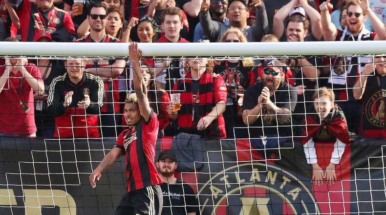 Atlanta United forward Josef Martinez hangs on the Chicago Fire goal after just missing a score during the second half of their MLS game on Saturday, March 18, 2017, in Atlanta. Martinez scored two goals during the 4-0 victory over the Chicago Fire. Curtis Compton/ccompton@ajc.com