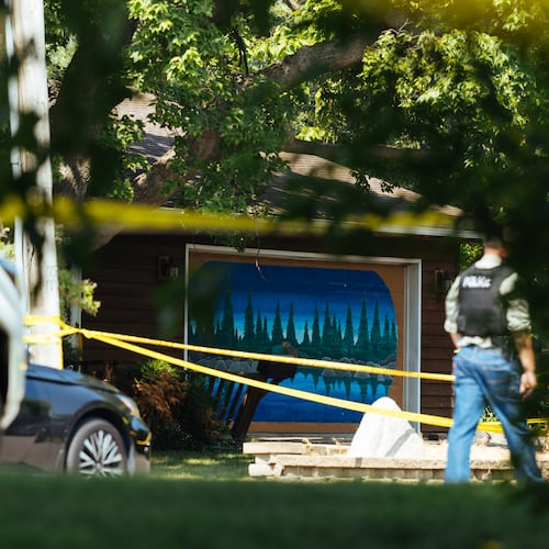 Law enforcement respond to a call at a home daycare, Wednesday, Aug. 12, 2026, in Hopkins, Minn. (AP Photo/Carly Danek)
