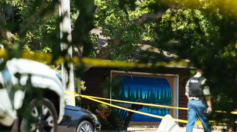 Law enforcement respond to a call at a home daycare, Wednesday, Aug. 12, 2026, in Hopkins, Minn. (AP Photo/Carly Danek)