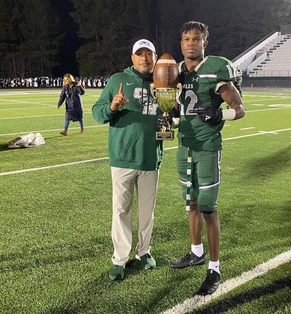 Former Collins Hill High standout Travis Hunter (right) poses for a photo with former Eagles wide receivers coach Todd Wofford after a game during the 2020 season. (Photo courtesy Todd Wofford)