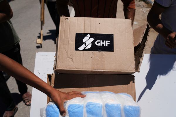 FILE - Boxes and bags of humanitarian aid delivered by the Gaza Humanitarian Foundation, a U.S.-backed organization approved by Israel, are seen in Khan Younis, southern Gaza Strip, on May 29, 2025. (AP Photo/Abdel Kareem Hana, File)