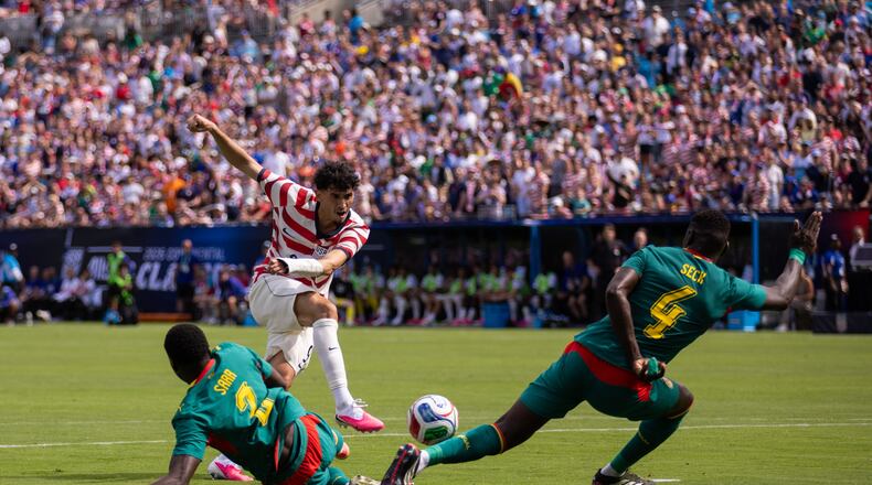 United States forward Ricardo Pepi, top left, has a shot blocked by Senegal defender Abdoulaye Seck (4) during the first half of an international friendly soccer match Sunday, May 31, 2026, in Charlotte, N.C. (AP Photo/Scott Kinser)