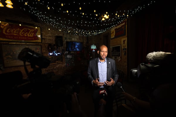 “If we make this campaign next year about individuals and about celebrity Democrats, we’ll lose again,” says Democratic candidate for governor Jason Esteves, shown here speaking to the press at Manuel's Tavern. (Arvin Temkar/AJC)