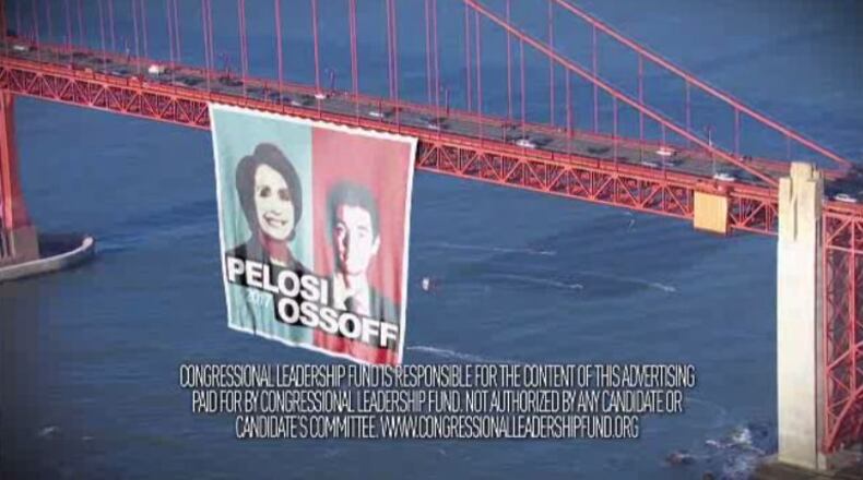 An image of Jon Ossoff on the Golden Gate Bridge replaced an image of him on a cable car after San Francisco officials threatened to sue a conservative super PAC.