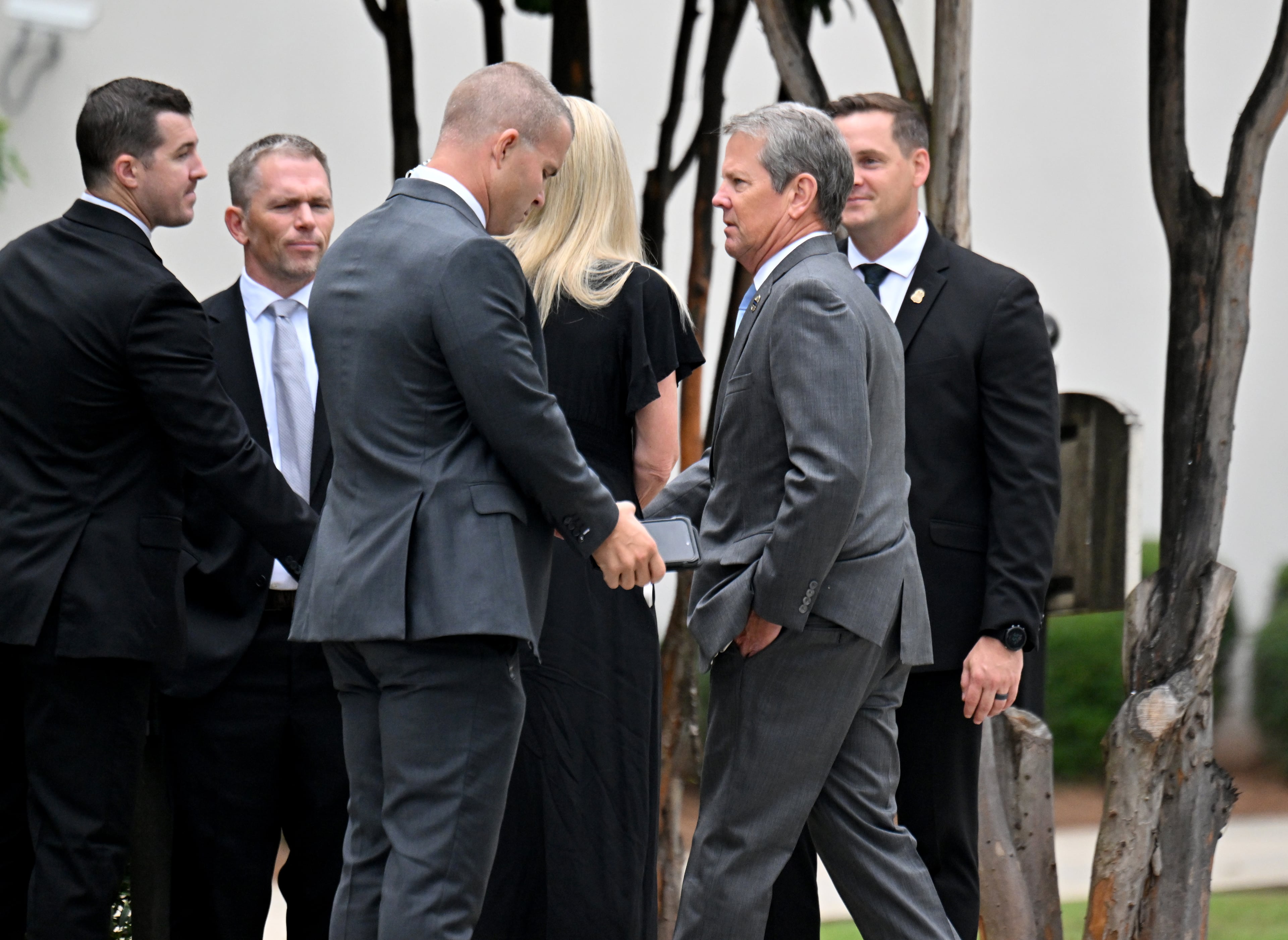 Gov. Brian Kemp arrives at First Baptist Church Atlanta, Friday, August 22, 2025, before the memorial service for DeKalb County police Officer David Rose, who was killed while responding to the Aug. 8 shooting at the CDC. (Hyosub Shin/AJC)