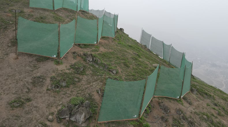 Fog catchers made of fabric on a hillside in Lima, Peru are providing some residents with water in the city of 10 million people with precious little rainfall.