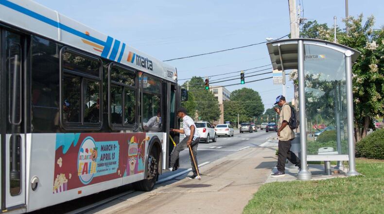 Beginning Thursday, MARTA will board passengers from the rear of buses and suspend collection of bus fares to protect drivers. Passengers normally board and pay at the front of the bus.
