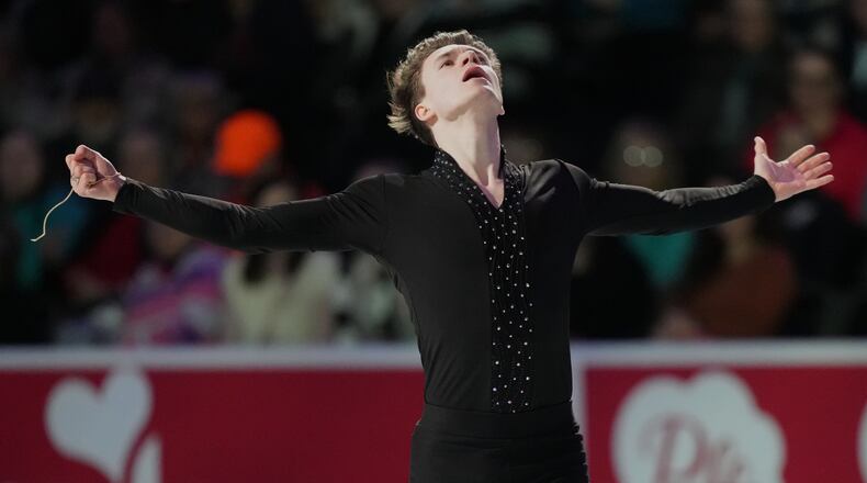 Maxim Naumov skates during the "Making Team USA" performance at the U.S. Figure Skating Championships, Sunday, Jan. 11, 2026, in St. Louis. (AP Photo/Stephanie Scarbrough)