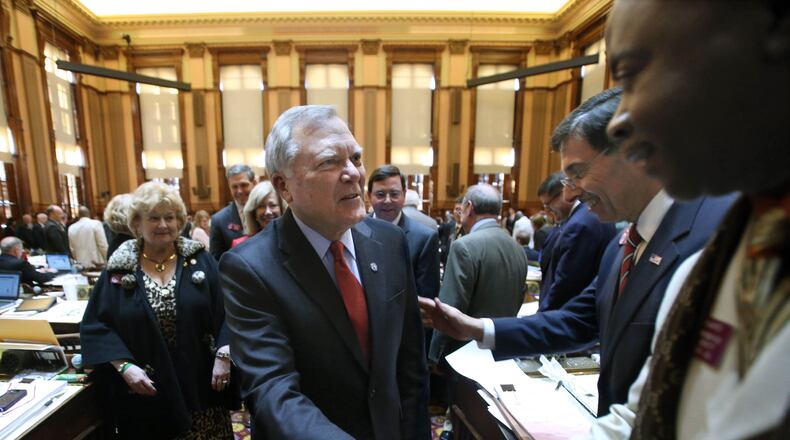 March 28, 2013 - Atlanta, Ga: Gov. Nathan Deal greets representatives after addressing the House Chamber during Legislative Day 40 at the Capitol Thursday night in Atlanta, Ga., March 28, 2013. Thursday is the last day of the 2013 Legislative Session. Gov. Deal paid a visit to the House and Senate thanking them for their work and wishing them a good summer. JASON GETZ / JGETZ@AJC.COM