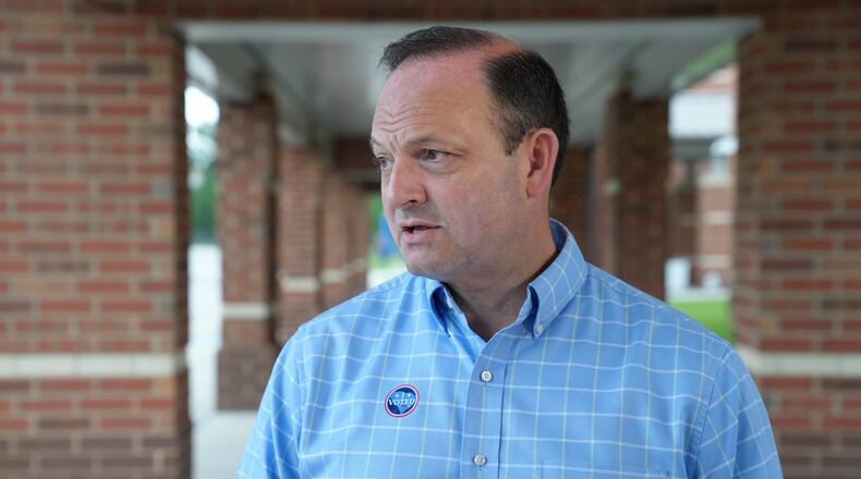 South Carolina Attorney General Alan Wilson, seeking to become the state's next governor, speaks with reporters after casting his ballot in the Republican primary runoff elections on Tuesday, June 23, 2026, in Lexington, S.C. (AP Photo/Meg Kinnard)
