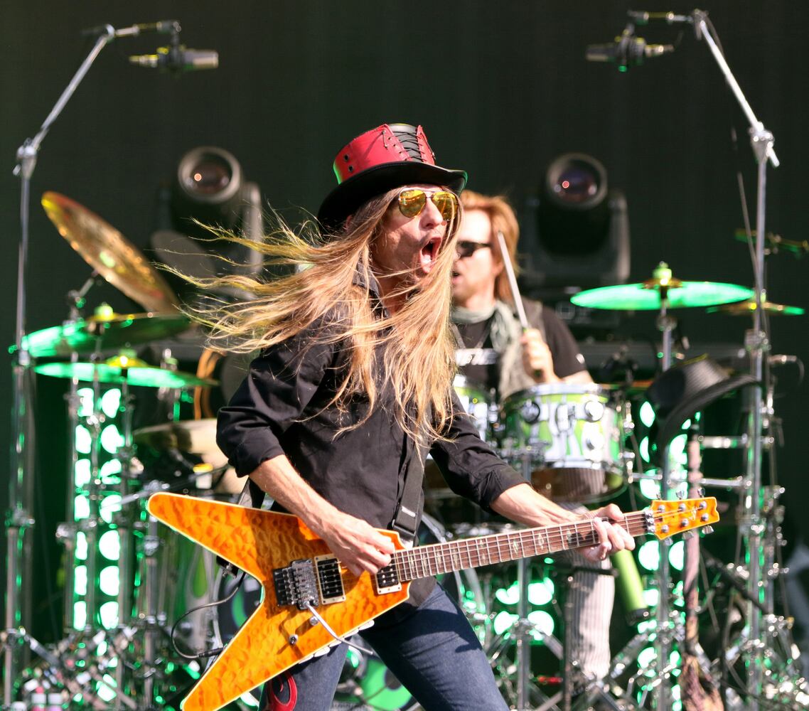 After two years of Covid cancellations, Def Leppard, Motley Crue, Poison and Joan Jett and the Blackhearts rocked sold out Truist Park on Thursday, June 16, 2022.
Robb Cohen for the Atlanta Journal-Constitution