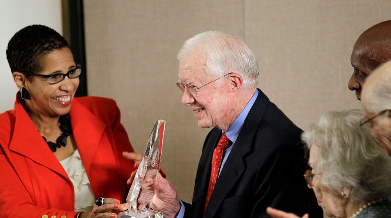 Judge Ann Claire Williams. 7th U.S. Circuit Court of Appeals, left, presents former President Jimmy Carter with an award recognizing his appointment of a large number of minority and female judges to the federal judiciary during his presidency, Thursday, June 14, 2012, in Atlanta. The Just the Beginning Foundation honored Carter with its Trailblazer Legend Award.