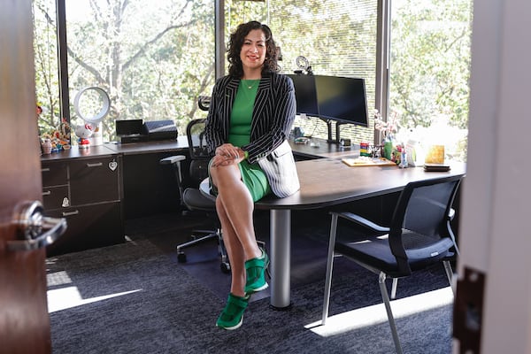 Marissa Maldonado, founder and CEO of Proda Technology, a managed IT and cybersecurity firm, poses for a photo in her office in Marietta on Thursday, Oct. 23, 2025. (Natrice Miller/ AJC)