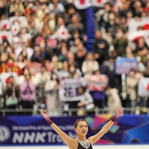 Kaori Sakamoto, of Japan, acknowledges the crowd after performing during the women' free skating program in the ISU Grand Prix of Figure Skating - NHK Trophy in Kadoma, east of Osaka, western Japan, Saturday, Nov. 8, 2025. (AP Photo/Hiro Komae)