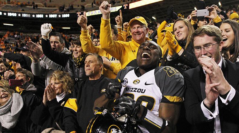 Missouri wide receiver Jimmie Hunt (88) celebrates with fans after an NCAA college football game against Tennessee on Saturday, Nov. 22, 2014, in Knoxville, Tenn. Missouri won 29-21. (AP Photo/Wade Payne)