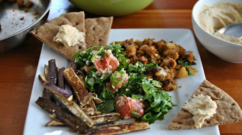 Falafel hash with grapefruit-arugula tabbouleh provides terrific source of protein. (Gretchen McKay/Pittsburgh Post-Gazette/TNS)