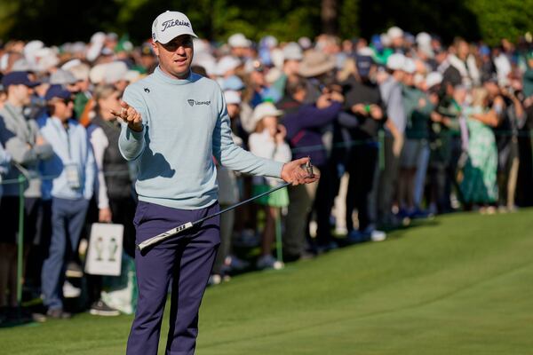 Justin Thomas warms up on the putting green during a practice round at the Masters golf tournament, Tuesday, April 8, 2025, in Augusta, Ga. (AP Photo/George Walker IV)