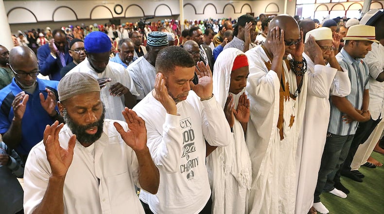 Participants join in the closing Janazah funeral prayer for Muhammad Ali at the conclusion of an interfaith memorial service at the Atlanta Masjid of Al-Islam on Thursday, June 9, 2016, in Atlanta. Curtis Compton / ccompton@ajc.com