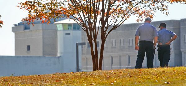 Prison officials at the Federal Penitentiary in southeast Atlanta, which includes a minimum-security camp. John Spink, jspink@ajc.com