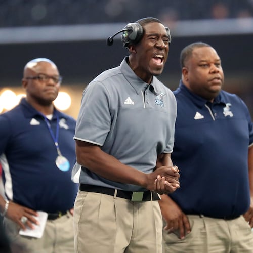 Jermaine “Jimmy” Smith coached for 12 years at Cedar Grove High School in Atlanta. He led the Saints to a 67-14-1 record and won two Class AAA state championships in 2016 and 2018. (Jason Getz/AJC 2018)