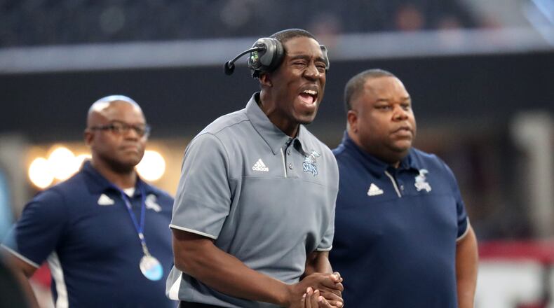 Cedar Grove coach Jermaine Smith reacts during the Class AAA championship game in Decamber against Peach County at Mercedes-Benz Stadium. Cedar Grove won 14-13. (JASON GETZ/SPECIAL TO THE AJC)