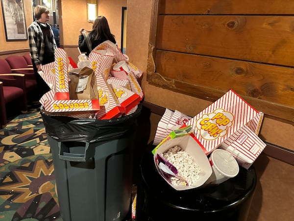 After two screenings of the “Stranger Things” series finale at the Tara Theatre on Wednesday, Dec. 31, 2025, employees faced overflowing garbage cans — thanks to the $7 vouchers patrons used for food and drink. (Rodney Ho/AJC)