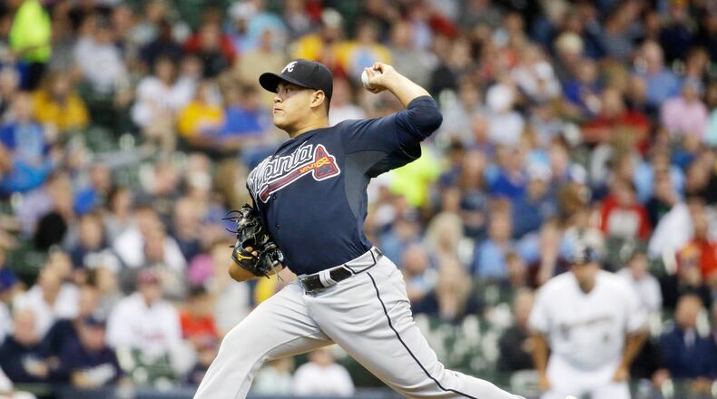 Atlanta Braves starting pitcher Manny Banuelos throws during the first inning of a baseball game against the Milwaukee Brewers Tuesday, July 7, 2015, in Milwaukee. (AP Photo/Morry Gash)