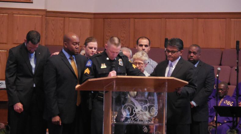 Sgt. Daniel Jones became emotional during his remarks at the interfaith service. Photo: Jennifer Brett