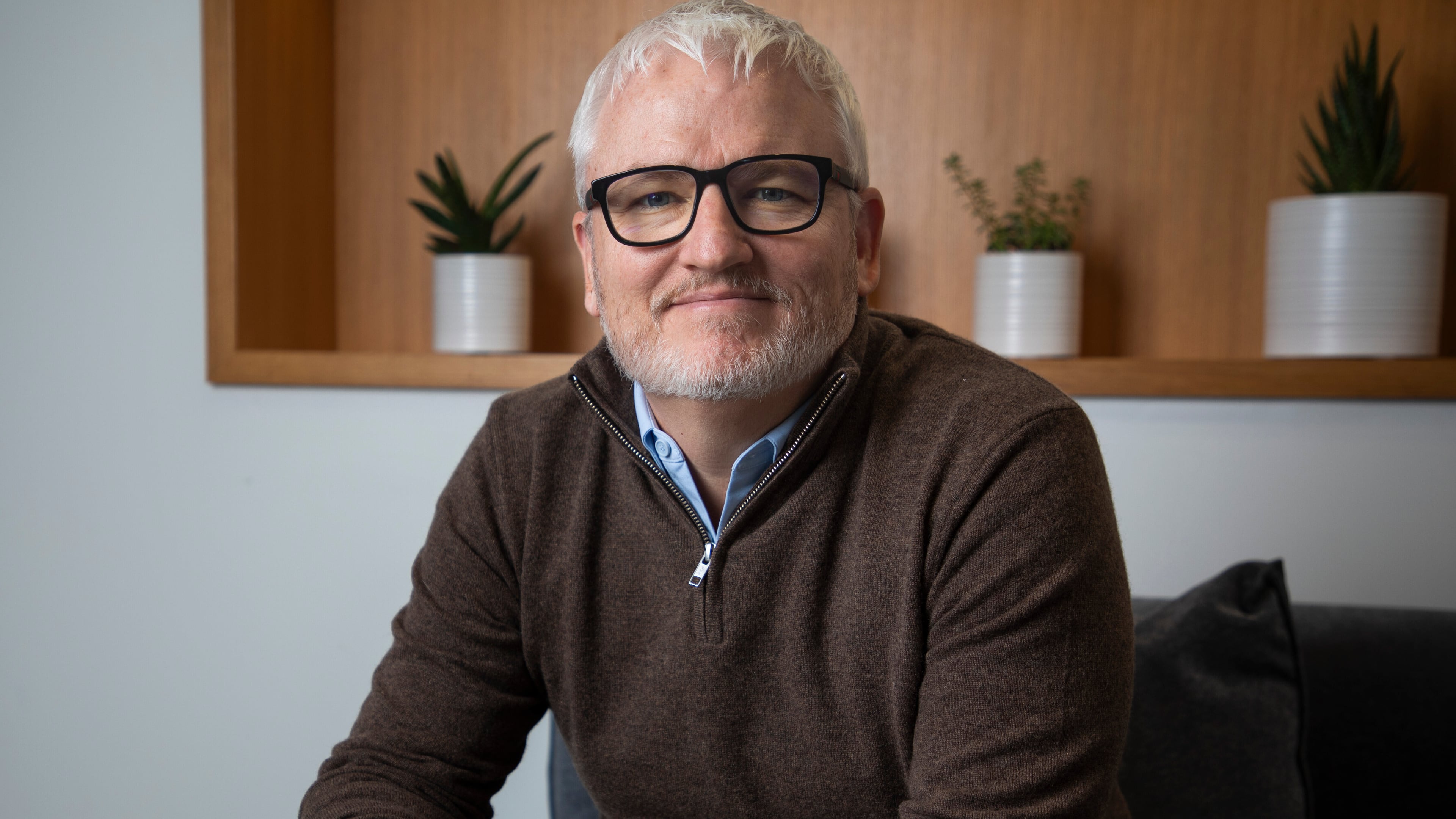 Ares Management partner Joel Holsinger poses for a portrait at his office in the Buckhead neighborhood of Atlanta, Monday, Oct. 13, 2025. (AP Photo/Olivia Bowdoin)