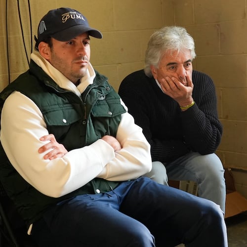 Trainers Gustavo Delgado Sr. and his son Gustavo Delgado Jr. watch a video of workouts after taking their horse, Kentucky Derby entrant The Puma, for a workout at Churchill Downs Thursday, April 30, 2026, in Louisville, Ky. (AP Photo/Charlie Riedel)