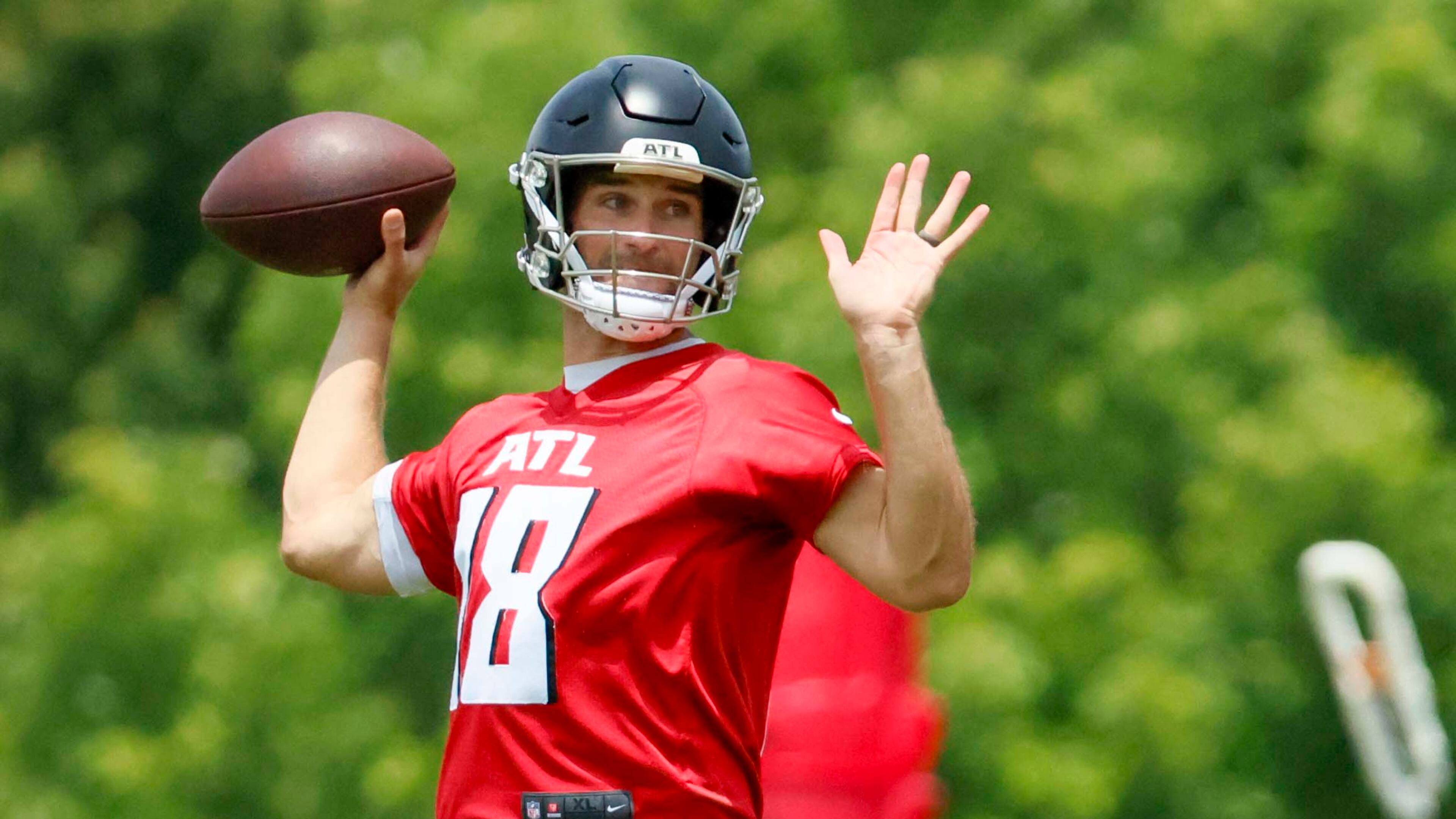 Atlanta Falcons quarterback Kirk Cousins attempts a pass during minicamp at the Atlanta Falcons Training Facility, Wednesday, June 11, 2025, in Flowery Branch. (Miguel Martinez/AJC)