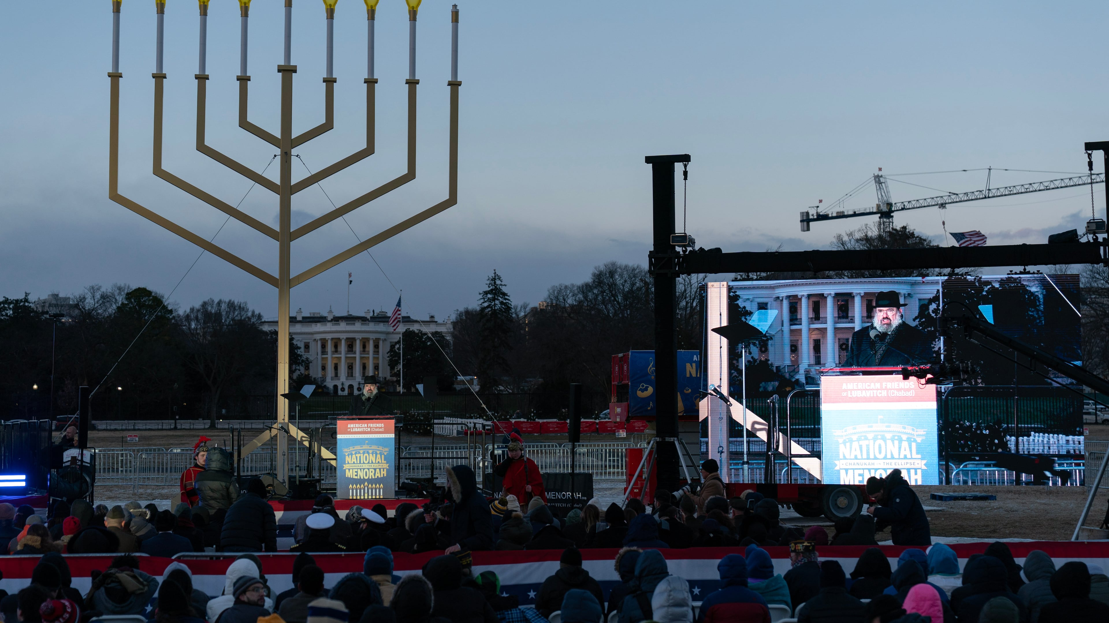 Rabbi Levi Shemtov speaks to the crowd before he lights the Menorah during the annual National Menorah Lighting in celebration of Hanukkah, on the Ellipse near the White House in Washington, Sunday, Dec. 14, 2025. (AP Photo/Jose Luis Magana)