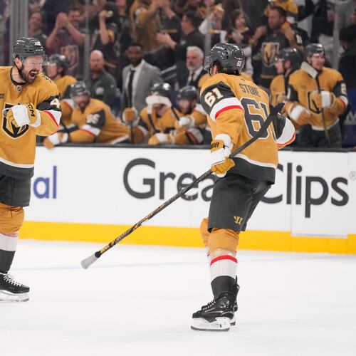 Vegas Golden Knights center Tomas Hertl, left, celebrates his goal with right wing Mark Stone during the third period in Game 3 of the Western Conference finals NHL hockey Stanley Cup playoff series against the Colorado Avalanche, Sunday, May 24, 2026, in Las Vegas. (AP Photo/Mark J. Terrill)