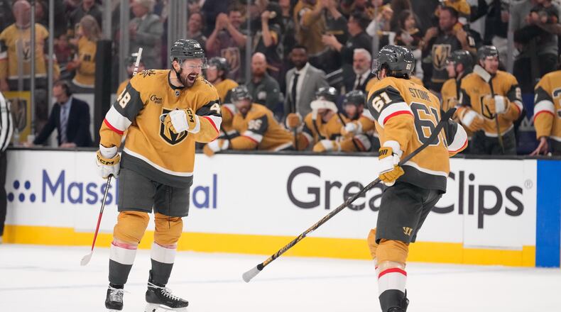 Vegas Golden Knights center Tomas Hertl, left, celebrates his goal with right wing Mark Stone during the third period in Game 3 of the Western Conference finals NHL hockey Stanley Cup playoff series against the Colorado Avalanche, Sunday, May 24, 2026, in Las Vegas. (AP Photo/Mark J. Terrill)