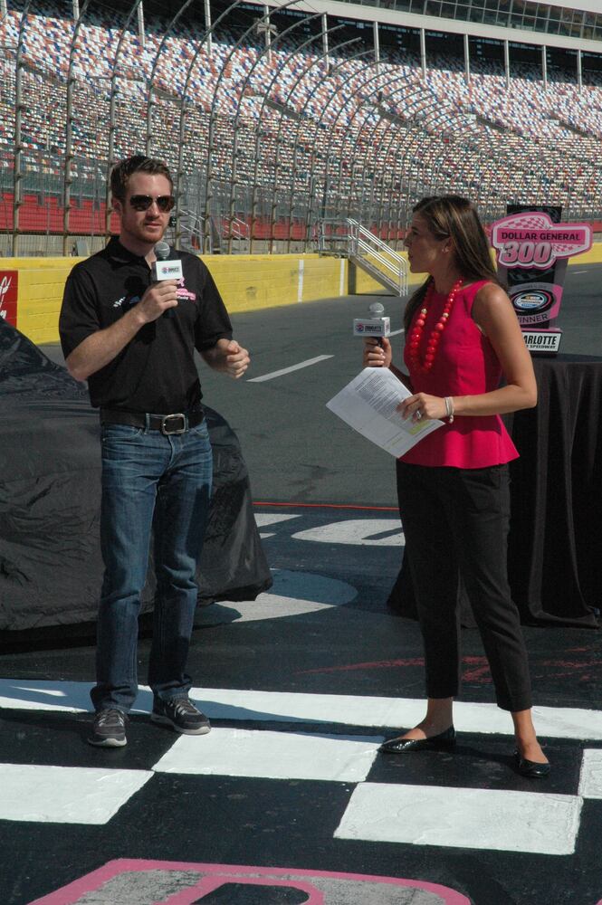 IMAGES: NASCAR drivers, breast cancer survivors paint pit road pink