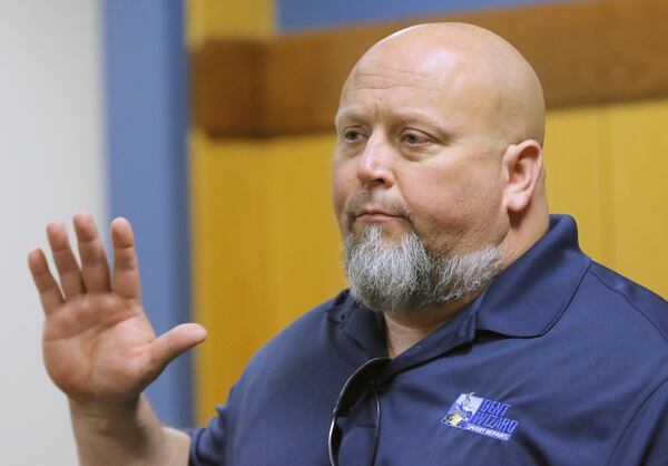 Kevin O’Neal prepares to testify about a 1990 case in which Tex McIver shot at a car O’Neal was in near McIver’s residence. BOB ANDRES /BANDRES@AJC.COM