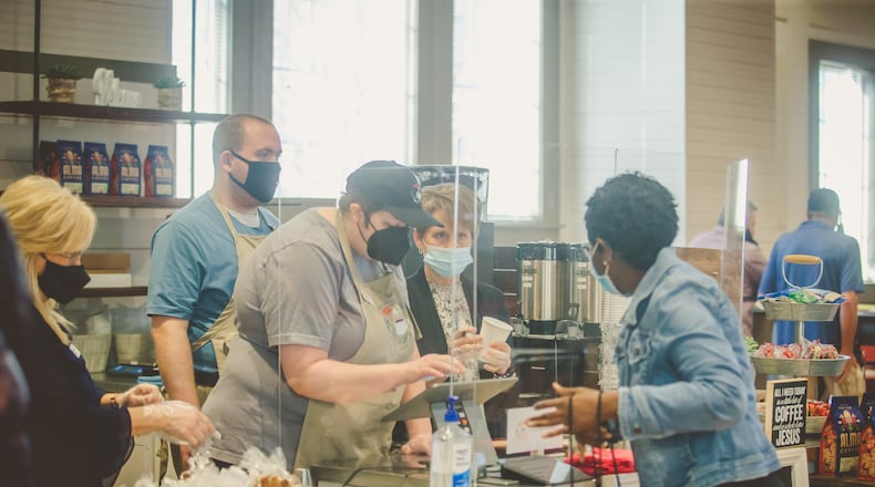 Circle of Friends recently opened a coffee shop inside 'The Circuit' serving Cherokee-based Alma Coffee, along with other drinks and offerings (L to R: Diane Keen, co-founder; KC, Barista; Alex, cashier; Julie Wagner, volunteer coordinator and Grace Nyaga, customer).