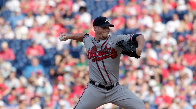 Atlanta Braves pitcher Craig Kimbrel throws against the Philadelphia Phillies in the ninth inning of a baseball game, Sunday, Sept. 28, 2014, in Philadelphia. The Braves won 2-1. (AP Photo/H. Rumph Jr)