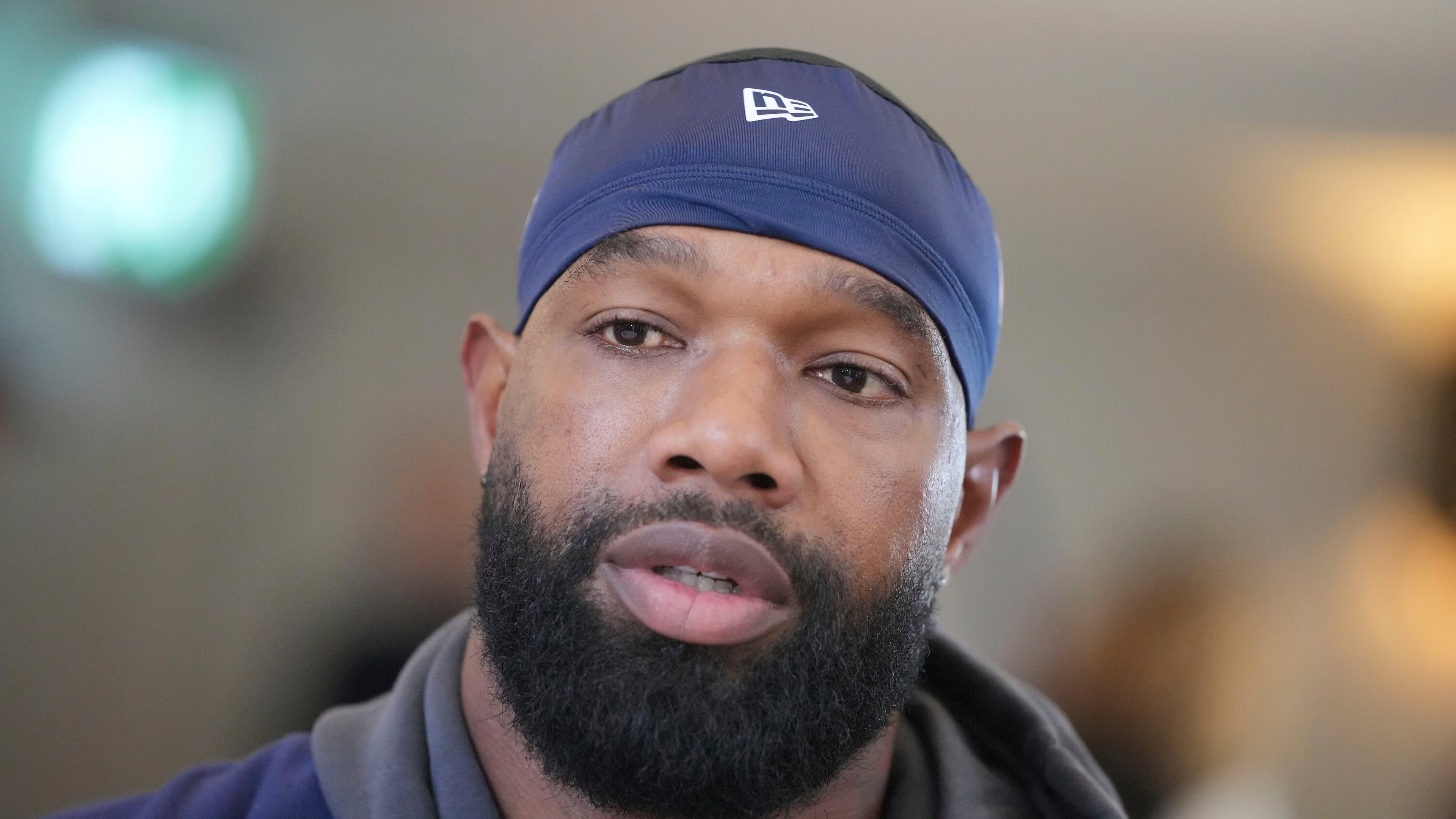 FILE - Chicago Bears tight end Marcedes Lewis (84), who recently signed with the Broncos, speaks during an interview after a NFL football training session in Ware, England, Oct. 11, 2024. (AP Photo/Kin Cheung, File)