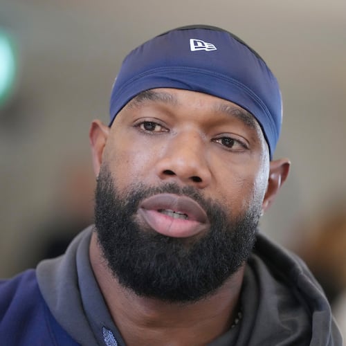 FILE - Chicago Bears tight end Marcedes Lewis (84), who recently signed with the Broncos, speaks during an interview after a NFL football training session in Ware, England, Oct. 11, 2024. (AP Photo/Kin Cheung, File)