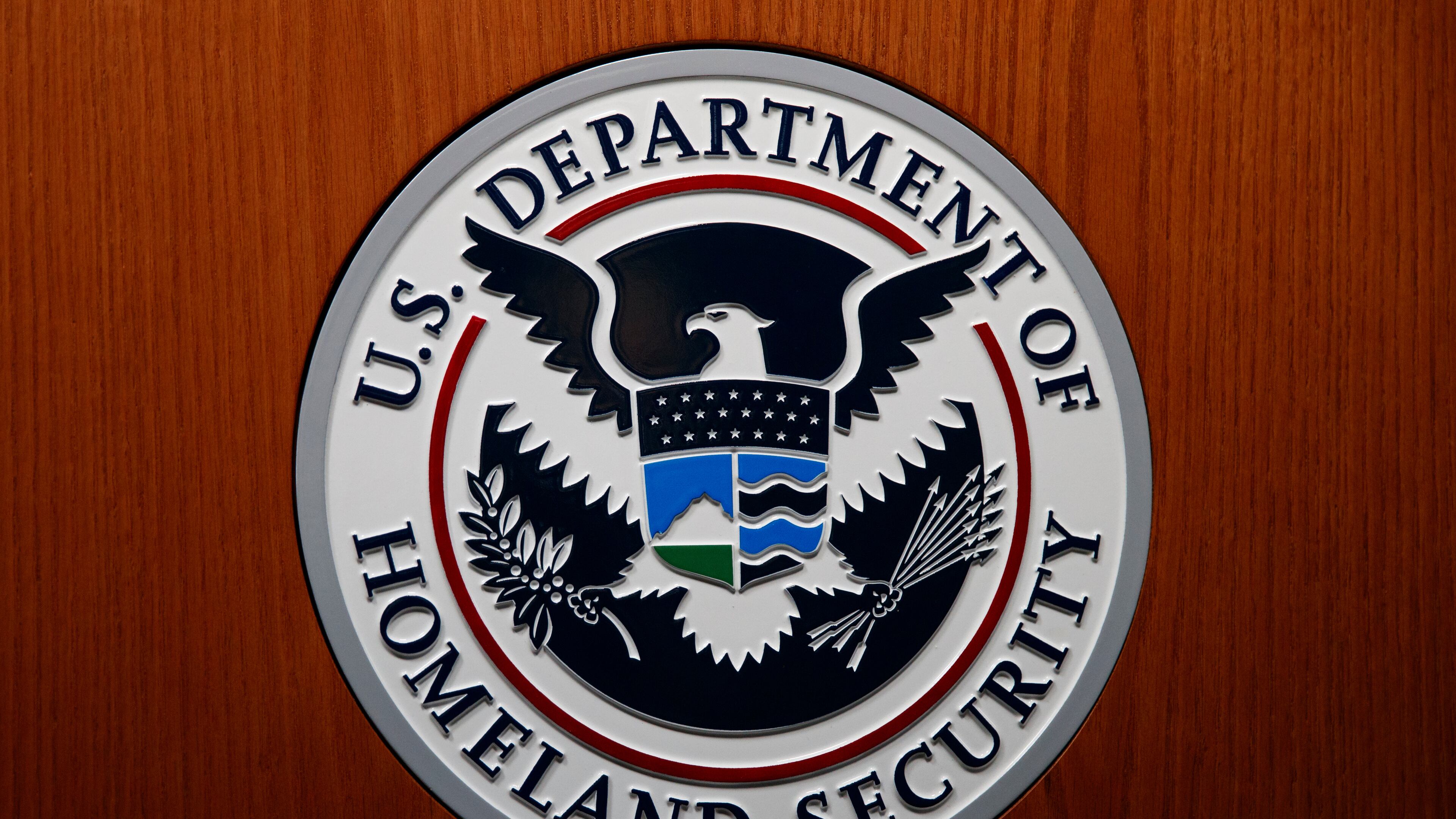 FILE - In this June 28, 2019, file photo the Department of Homeland Security (DHS) seal is seen during a news conference in Washington. (AP Photo/Carolyn Kaster, File)