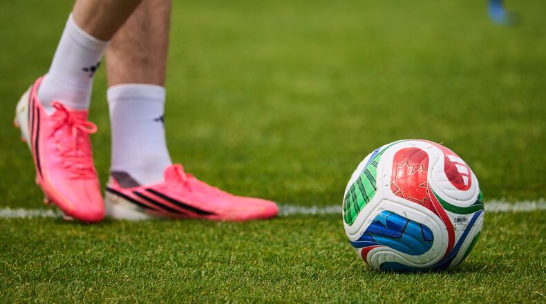 A Canadian flag is seen on a FIFA soccer ball during a World Cup soccer training session in Toronto, Tuesday, June 9, 2026. (Sammy Kogan/The Canadian Press via AP)
