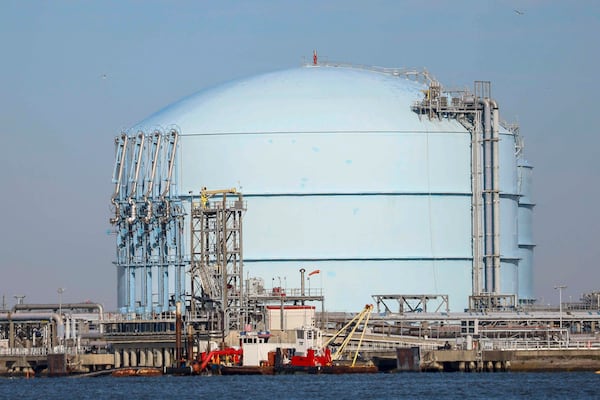 One of the Southern LNG Company’s liquefied natural gas tanks is shown from the Savannah River. (Miguel Martinez/AJC)