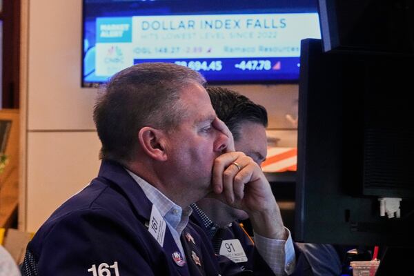 Trader Thomas McCauley works on the floor of the New York Stock Exchange, Monday, April 21, 2025. (AP Photo/Richard Drew)