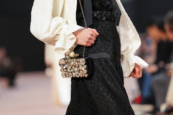 A model wears a creation as part of the Chanel Fall/Winter 2025-2026 Womenswear collection presented Tuesday, March 11, 2025. in Paris. (Photo by Scott A Garfitt/Invision/AP)