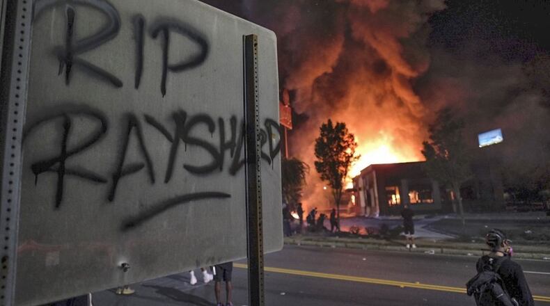 Fulton County District Attorney Fani Willis said metro Atlanta authorities support the right to peaceful protests, but that law enforcement could not tolerate violent acts like arson.